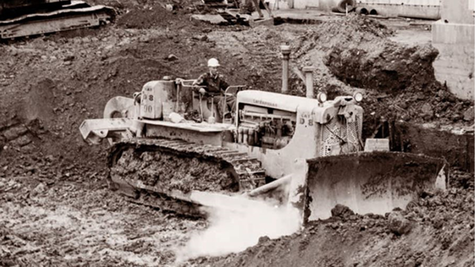 D8 15A with 8S blade and No. 30 cable control excavates foundation for a power plant extension